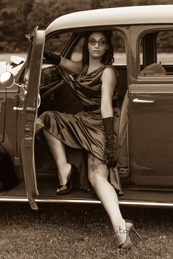 Girl in vintage car